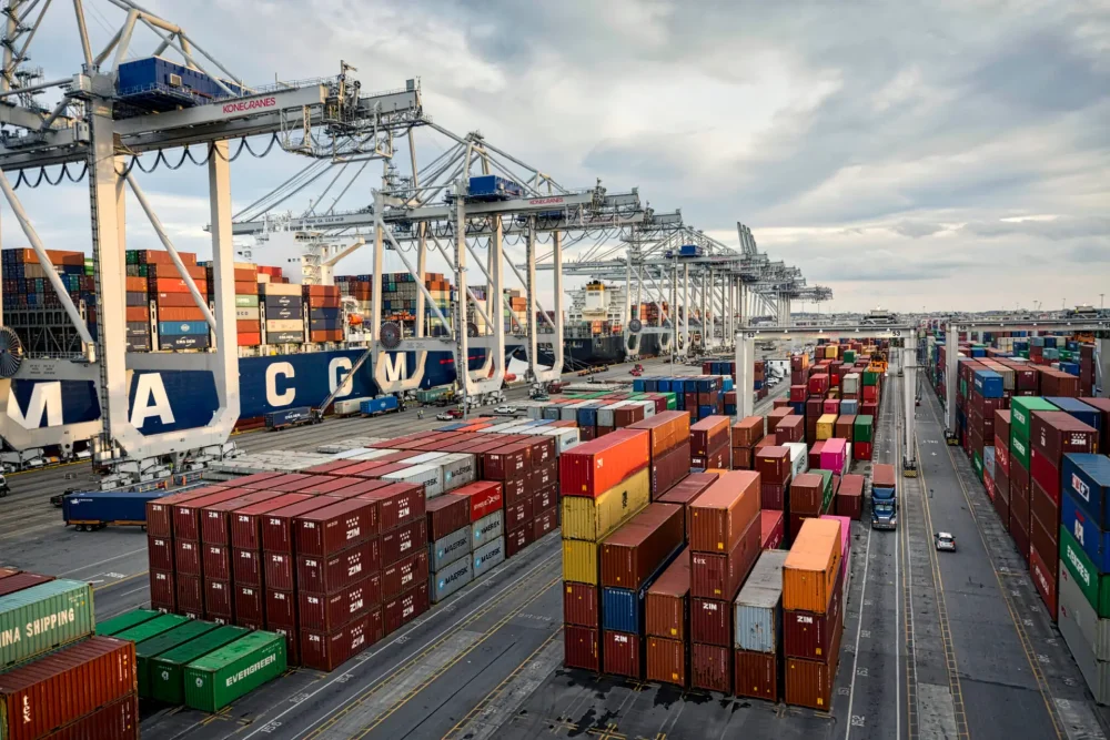 Rubber tire gantry work stack containers 
on the Georgia Ports Authority's Port of Savannah Garden City Terminal, Wednesday, Jan., 2, 2019, in Savannah, Ga.  (GPA Photo/Stephen B. Morton)